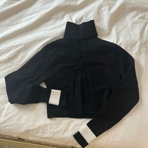 Black Turtleneck Sweater with White Accents